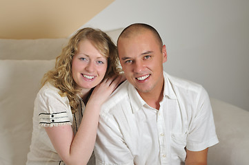 Image showing happy young couple smilling