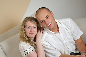 Image showing happy young couple smilling