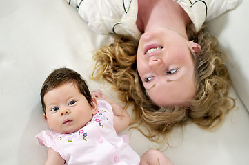 Image showing young mother and baby relaxing 