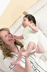 Image showing young mother and baby relaxing 