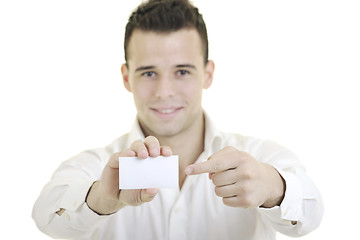 Image showing young business man with empty card isolated on white