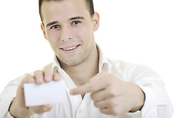 Image showing young business man with empty card isolated on white