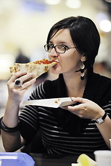 Image showing woman eat pizza food at restaurant