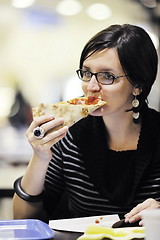 Image showing woman eat pizza food at restaurant