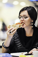 Image showing woman eat pizza food at restaurant