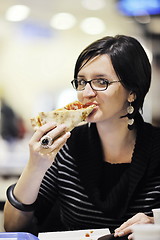 Image showing woman eat pizza food at restaurant