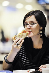 Image showing woman eat pizza food at restaurant