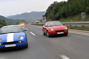 Image showing Tuning cars sacing down the highway