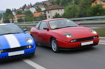 Image showing Tuning cars sacing down the highway