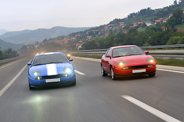 Image showing Tuning cars sacing down the highway