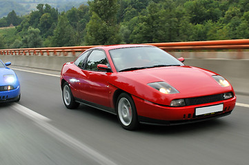 Image showing Tuning cars sacing down the highway