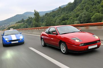 Image showing Tuning cars sacing down the highway