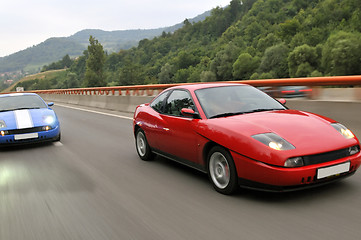 Image showing Tuning cars sacing down the highway