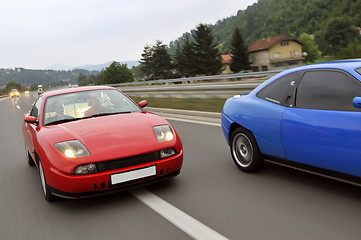 Image showing Tuning cars sacing down the highway