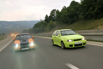 Image showing Tuning cars sacing down the highway