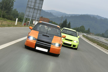 Image showing Tuning cars sacing down the highway