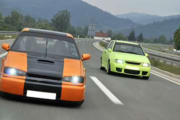 Image showing Tuning cars sacing down the highway