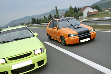 Image showing Tuning cars sacing down the highway