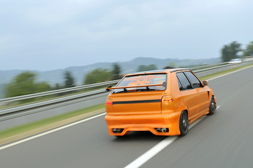 Image showing Tuning cars sacing down the highway