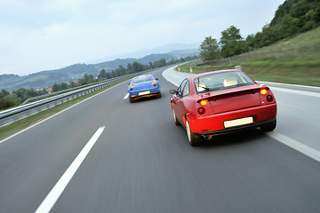 Image showing Tuning cars sacing down the highway