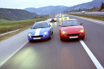 Image showing Tuning cars sacing down the highway