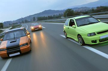 Image showing Tuning cars sacing down the highway