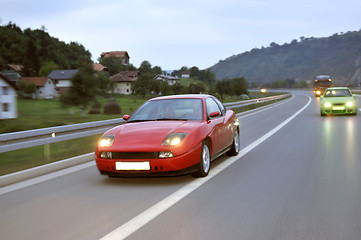 Image showing Tuning cars sacing down the highway