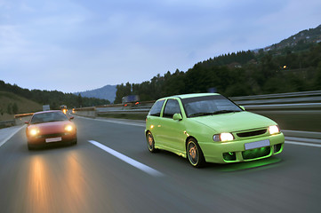 Image showing Tuning cars sacing down the highway