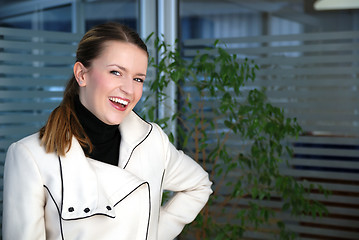 Image showing smilling businesswoman in office