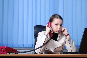 Image showing .young businesswoman working on a laptop computer in the office