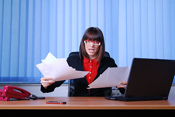 Image showing .angry businesswoman holding empty documents | UNFINISHED JOB CO