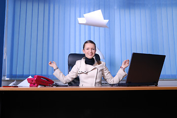 Image showing .happy businesswoman throwing papers in air