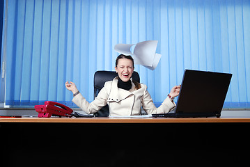 Image showing .happy businesswoman throwing papers in air