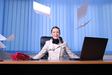 Image showing .happy businesswoman throwing papers in air