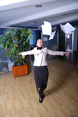 Image showing .happy businesswoman throwing documents 