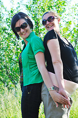 Image showing woman pragnant outdoor with friend