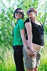 Image showing woman pragnant outdoor with friend