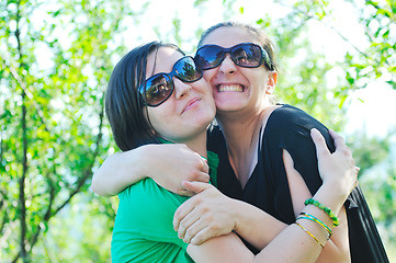 Image showing woman pragnant outdoor with friend