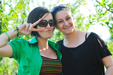 Image showing woman pragnant outdoor with friend