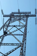 Image showing electricity pylon  against blue sky