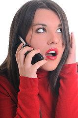 Image showing woman in red talking on cellphone