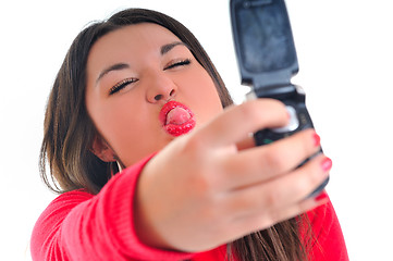 Image showing woman in red talking on cellphone