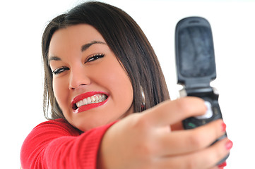 Image showing woman in red talking on cellphone