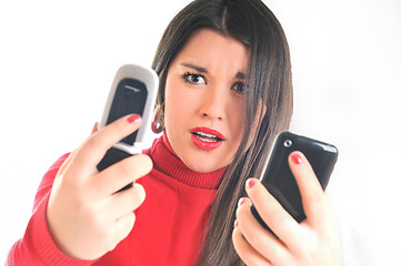 Image showing woman in red talking on cellphone