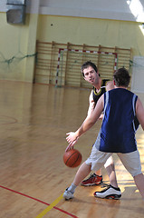 Image showing basketball duel