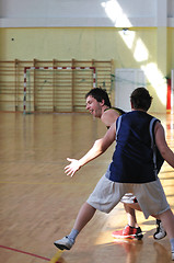 Image showing basketball duel