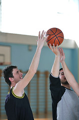 Image showing basketball duel