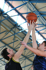 Image showing basketball duel