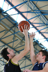 Image showing basketball duel