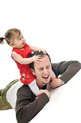 Image showing young father  play with beautiful daughter 